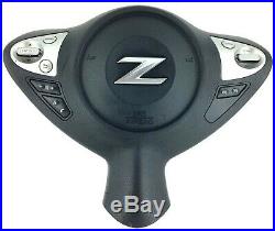 Genuine OEM Nissan 370z drivers steering wheel airbag with switches. 6E
