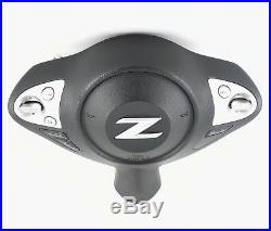 Genuine OEM Nissan 370z drivers steering wheel airbag with switches. SUPERB